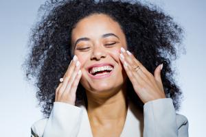 Woman smiling with rejuvenated skin 